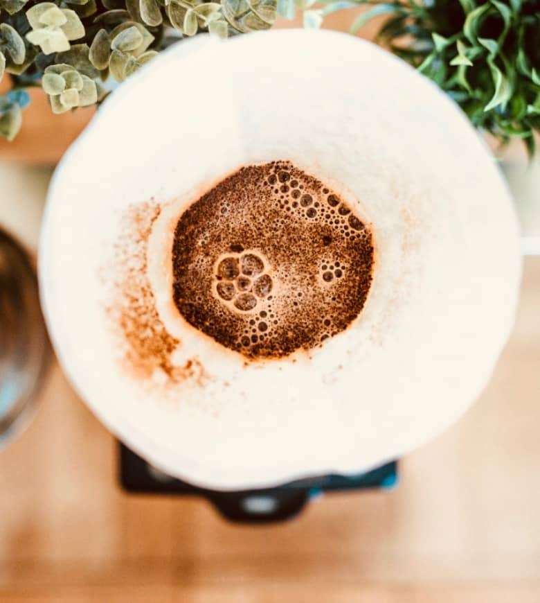Pouring the bloom in a chemex coffee maker