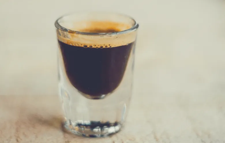 Photo of espresso shot with crema on top