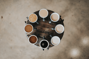 Photo of different types of coffees in cups