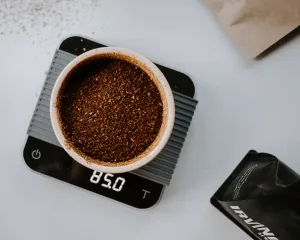 photo of ground coffee on scale