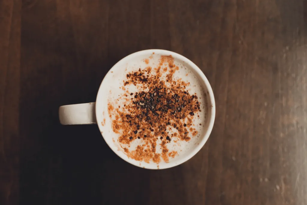Photo of cappuccino with chocolate sprinkled on top