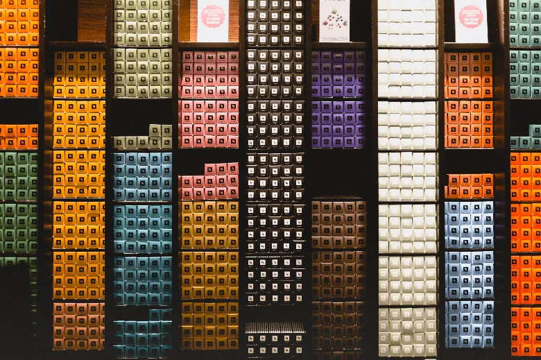 A display of Nespresso capsules inside a Nespresso store