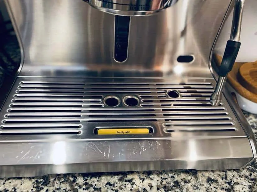 Cleaning the drip tray of a Breville espresso machine