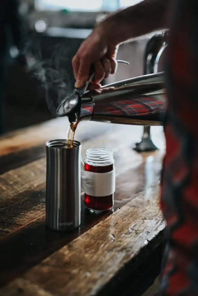 Coffee Carafe pouring in travel mug